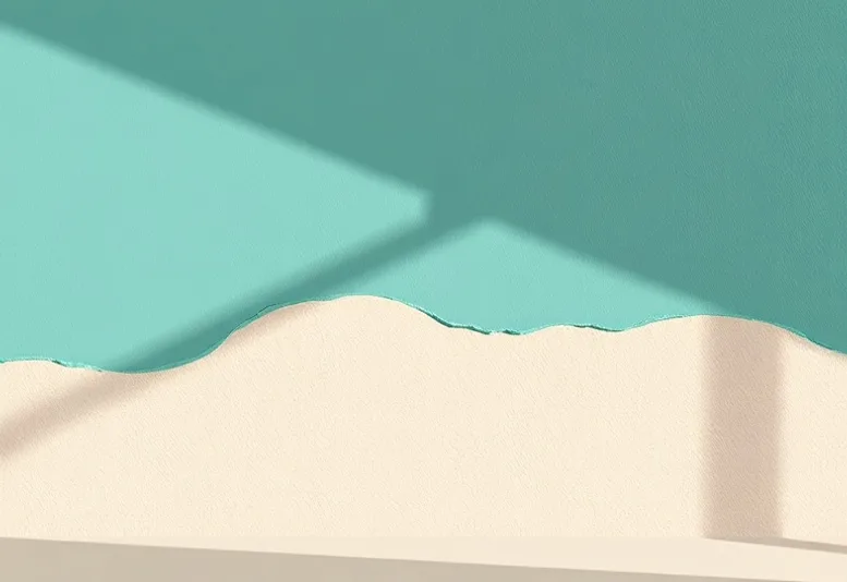 Application d'un enduit décoratif à la lisseuse sur un mur